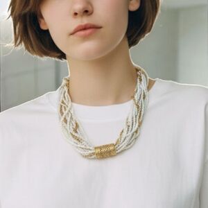 Elegant Gold and White Beaded Necklace 1928 branded